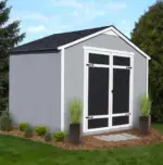 10x8 Outdoor Wood Storage Shed ,A small shed featuring a door and windows, set against a natural backdrop, showcasing its rustic charm and functionality