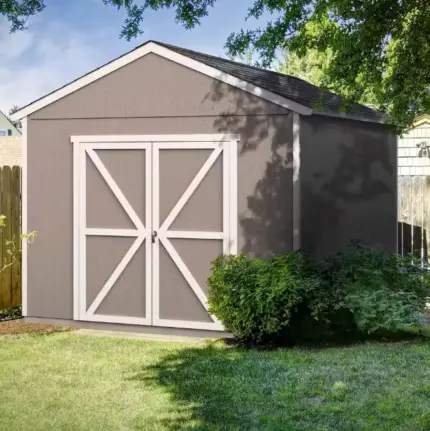 10x12 Backyard Wood Storage Shed ,Do-It-Yourself Rookwood 120 sq. ft ,A small shed nestled in a backyard, surrounded by a wooden fence, creating a cozy outdoor space